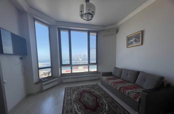 Апартаменты с панорамными окнами и видом на море